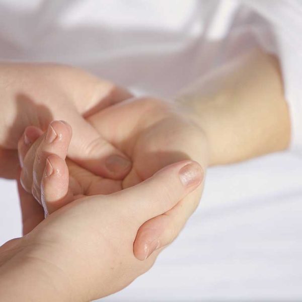 chiropractor-treating-hand-pain-3